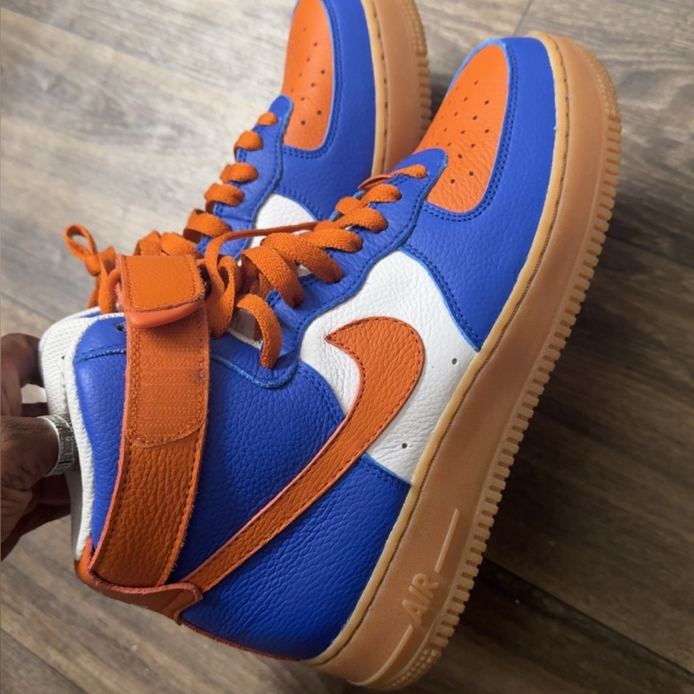 Nike Blue and Orange Sneakers with Classic Design